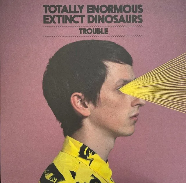 TOTALLY ENORMOUS EXTINCT DINOSAURS / TROUBLE